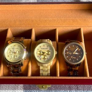 Three authentic michael kors watches